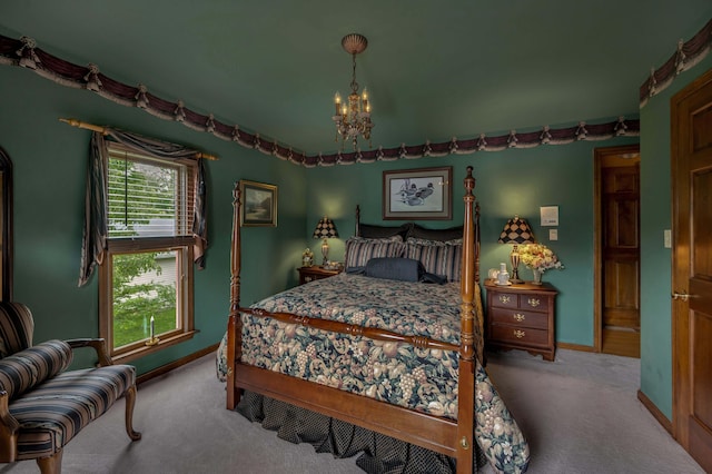 1023 Riverside Dr, Greenup, KY 41144 - carpeted bedroom featuring a chandelier and baseboards