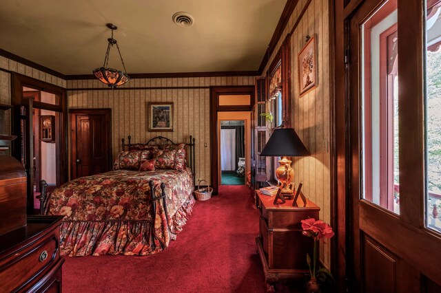 1023 Riverside Dr, Greenup, KY 41144 - bedroom with crown molding, dark carpet, and multiple windows