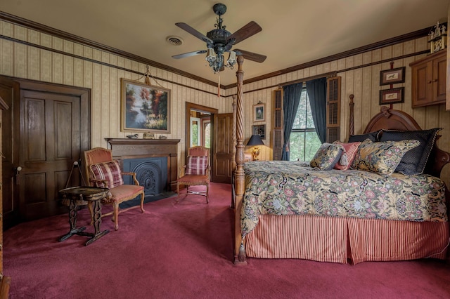 1023 Riverside Dr, Greenup, KY 41144 - carpeted bedroom with ornamental molding, a fireplace with flush hearth, and ceiling fan