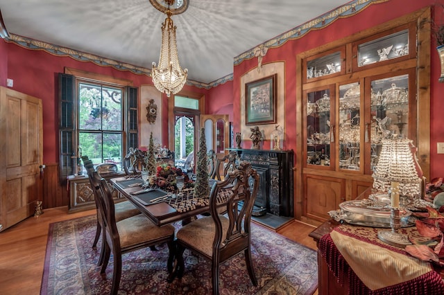 1023 Riverside Dr, Greenup, KY 41144 - dining room featuring a chandelier and wood finished floors