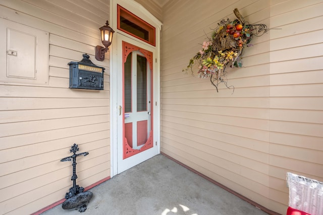 1023 Riverside Dr, Greenup, KY 41144 - view of exterior entry featuring a porch