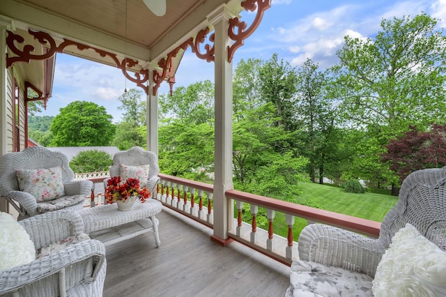 1023 Riverside Dr, Greenup, KY 41144 - wooden deck featuring a porch, ceiling fan, and view of scattered trees