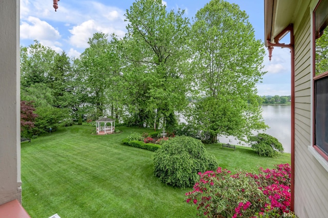 1023 Riverside Dr, Greenup, KY 41144 - view of green lawn with a gazebo, a water view, and view of scattered trees