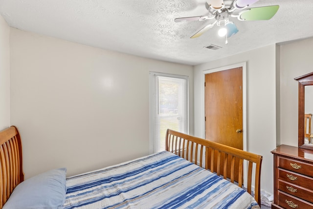 858 Lylesville St, Paris, KY 40361 - bedroom with ceiling fan and a textured ceiling