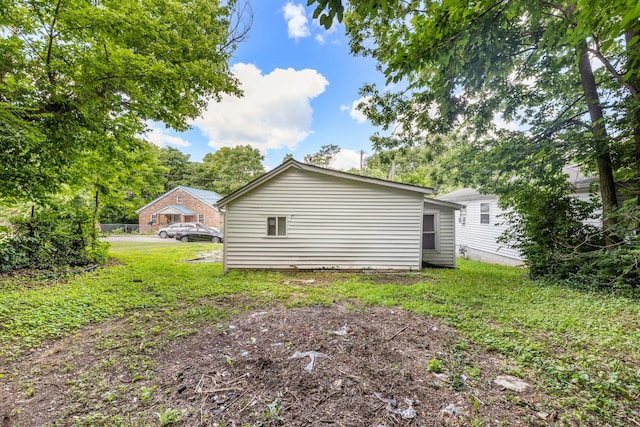 858 Lylesville St, Paris, KY 40361 - view of home's exterior featuring a lawn