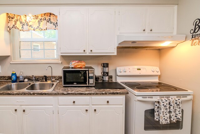 kitchen featuring sink, white cabinetry, and white electric stove