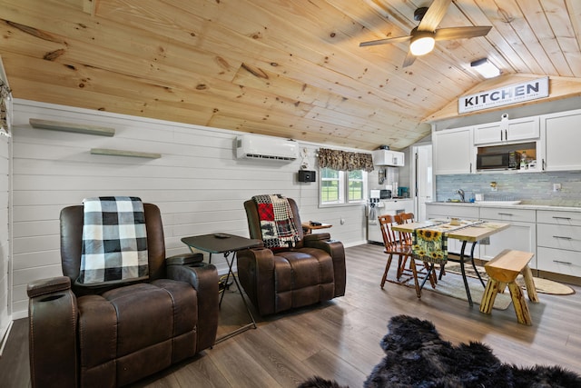 living room with hardwood / wood-style floors, wood walls, wooden ceiling, vaulted ceiling, and a wall mounted AC