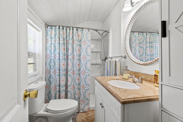 bathroom featuring a shower with shower curtain, plenty of natural light, toilet, and ornamental molding