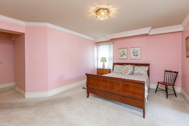 bedroom with ornamental molding and light colored carpet