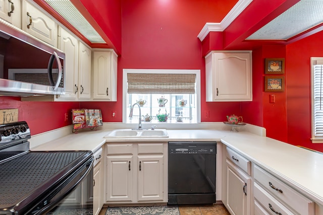 kitchen featuring black appliances, white cabinets, sink, ornamental molding, and light tile patterned flooring