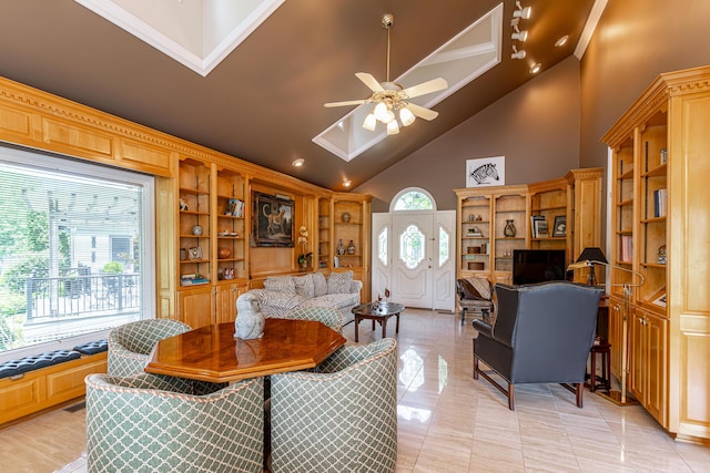 living room featuring high vaulted ceiling, light tile patterned floors, built in features, and ceiling fan