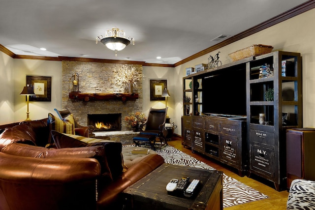 living room with visible vents, ornamental molding, wood finished floors, recessed lighting, and a fireplace