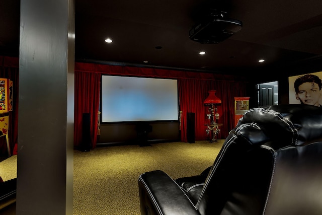 carpeted cinema room with recessed lighting and wood walls