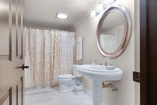 full bath with a shower with shower curtain, toilet, crown molding, and tile patterned flooring