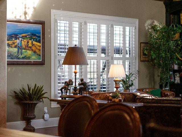 living room featuring baseboards