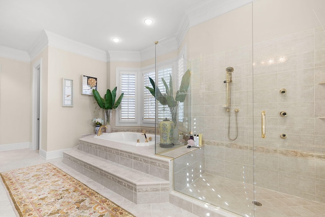 bathroom featuring crown molding, a garden tub, baseboards, and a tile shower