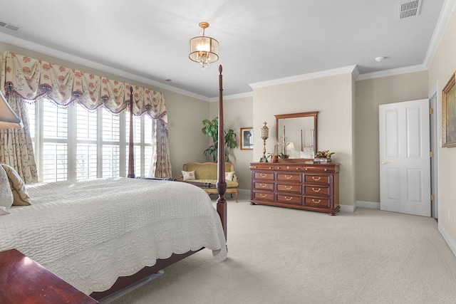 carpeted bedroom with visible vents, crown molding, and baseboards