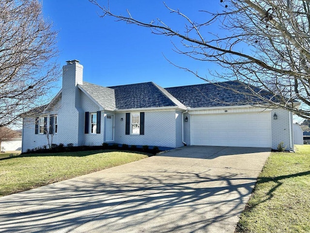 ranch-style home with a garage and a front lawn