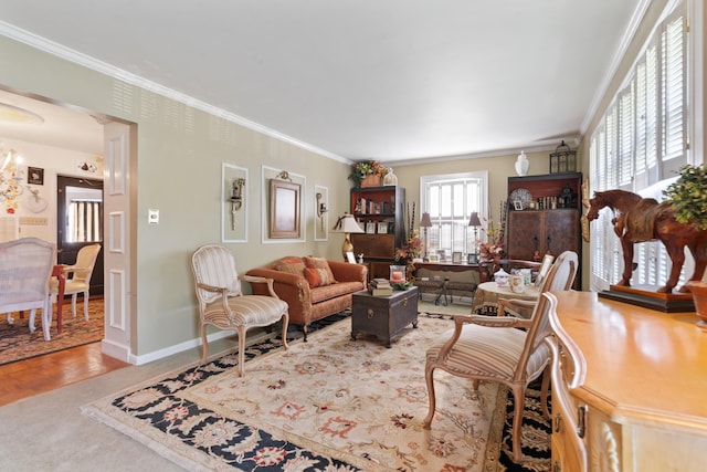 living room with hardwood / wood-style floors and crown molding