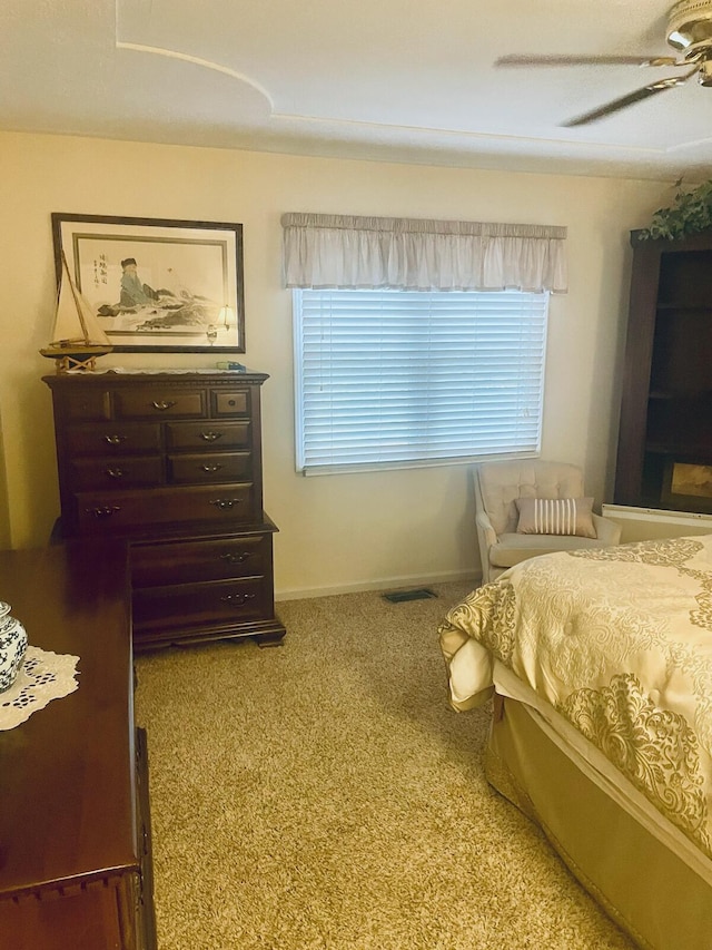 bedroom featuring carpet flooring and ceiling fan