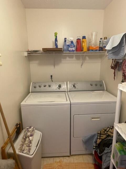 laundry room featuring washer and clothes dryer