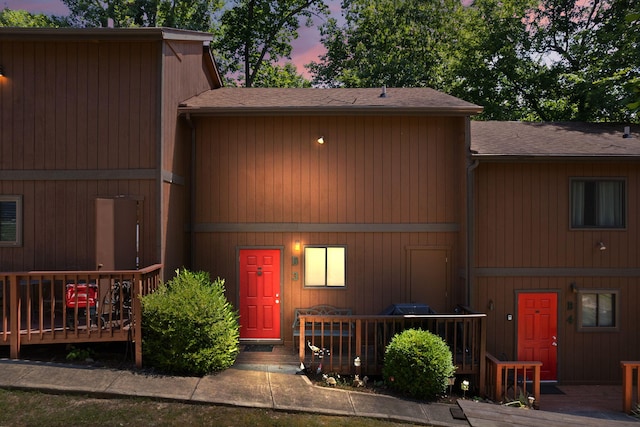 view of front of home with a wooden deck