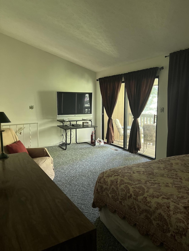 bedroom featuring carpet flooring, access to exterior, and vaulted ceiling