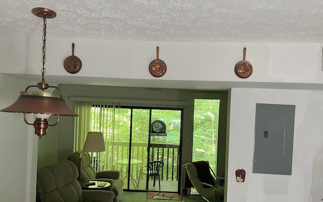 interior space with electric panel and a textured ceiling