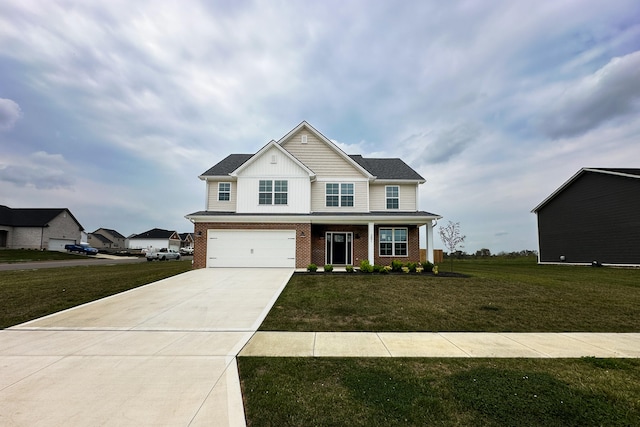 view of front of property with a garage and a front lawn