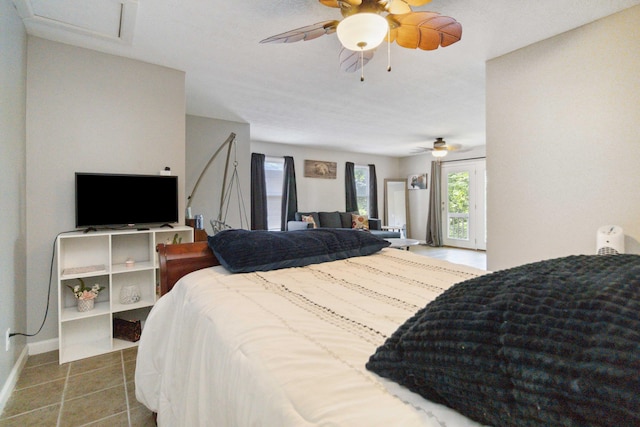 bedroom with ceiling fan and light colored carpet