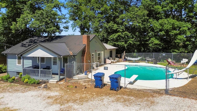 view of front of property featuring central air condition unit and a porch