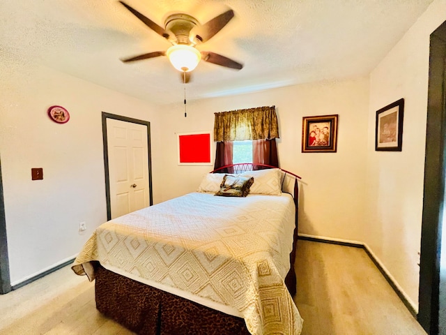 bedroom featuring ceiling fan and hardwood / wood-style flooring