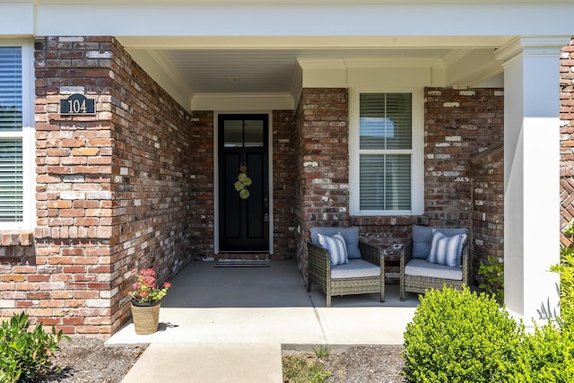 property entrance featuring covered porch