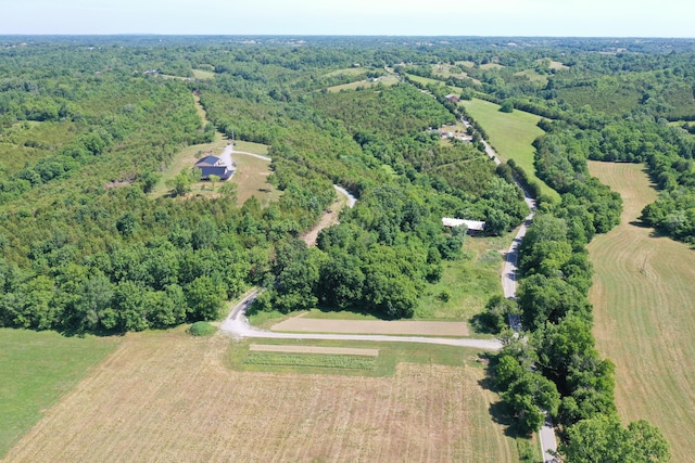 birds eye view of property featuring a rural view