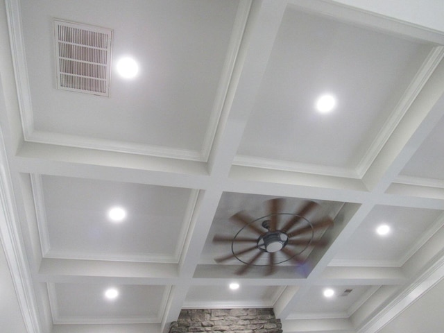details featuring coffered ceiling, beam ceiling, visible vents, and ceiling fan