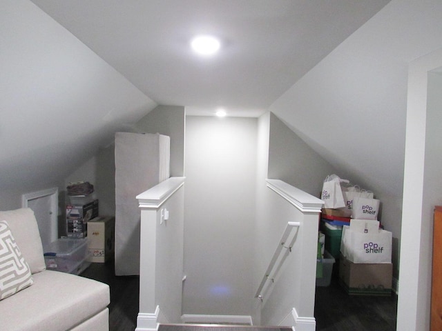 bonus room with vaulted ceiling and wood finished floors