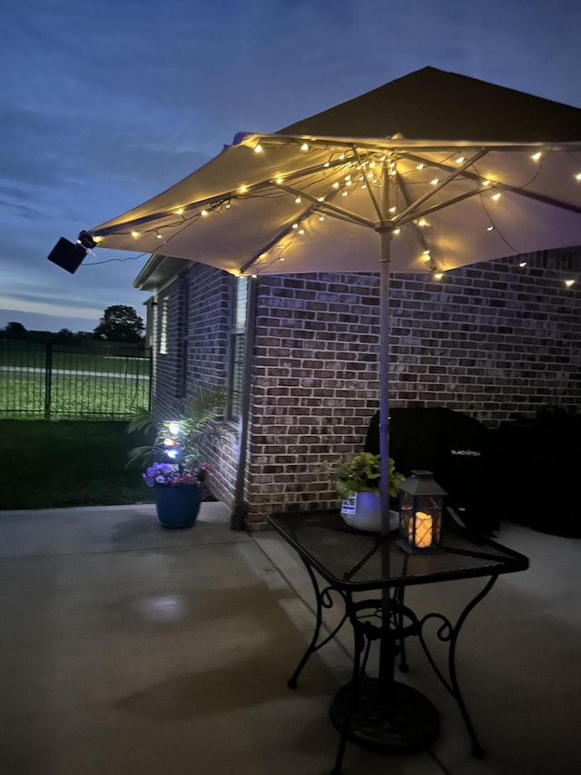 patio at twilight with fence
