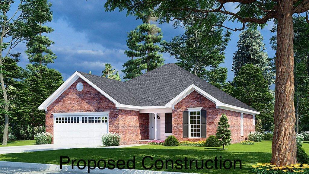 view of front facade with a garage and a front lawn