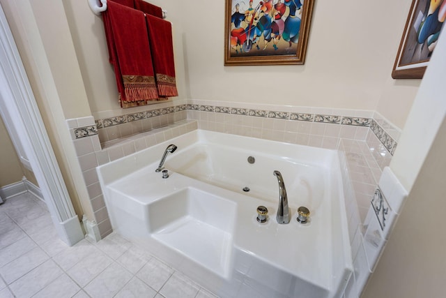 bathroom featuring tile patterned floors and a washtub