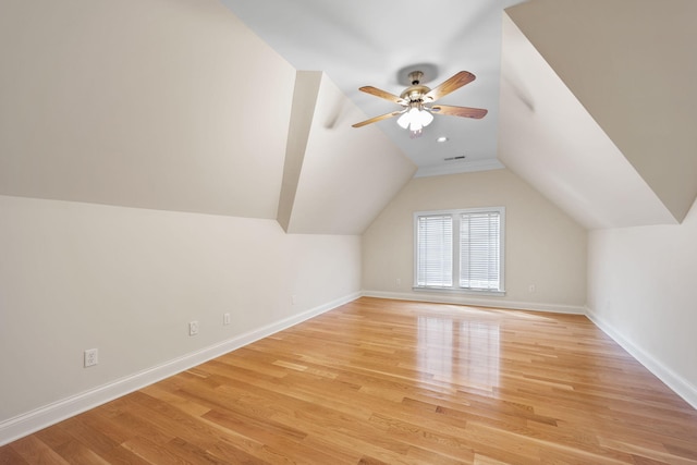 bonus room with ceiling fan, light hardwood / wood-style flooring, and lofted ceiling