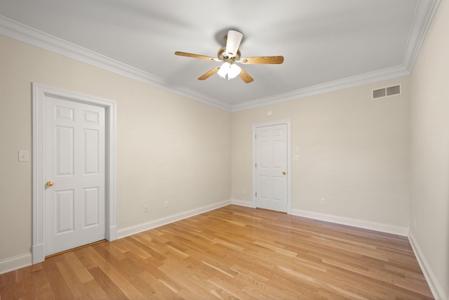 unfurnished room featuring crown molding, ceiling fan, and light wood-type flooring