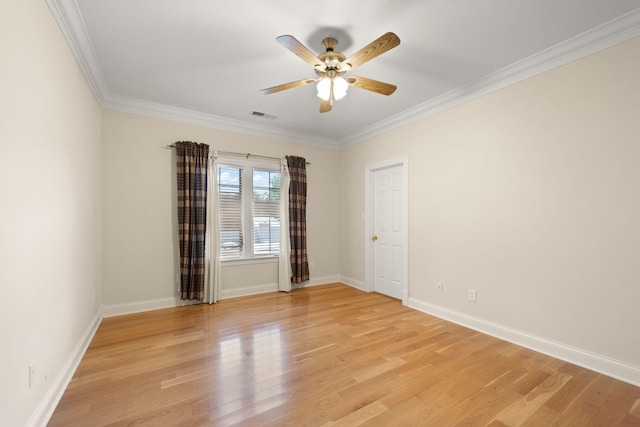 unfurnished room featuring crown molding, light hardwood / wood-style flooring, and ceiling fan