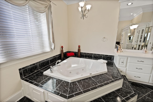 bathroom featuring plenty of natural light, vanity, ornamental molding, and tiled bath