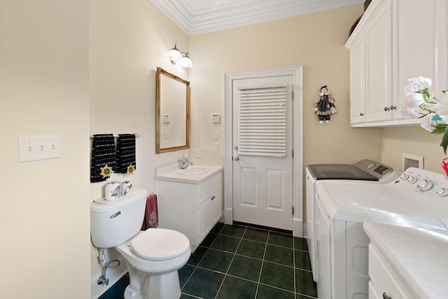 bathroom featuring tile patterned floors, ornamental molding, vanity, independent washer and dryer, and toilet