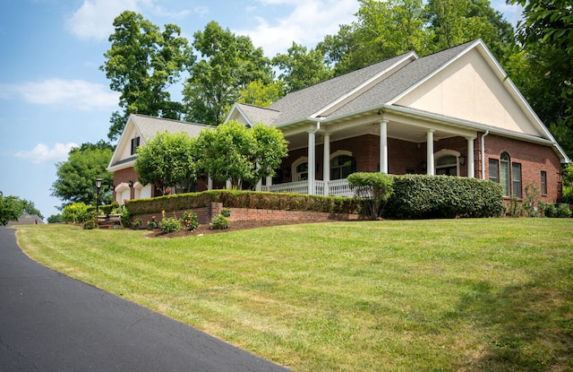 view of front of home with a front lawn