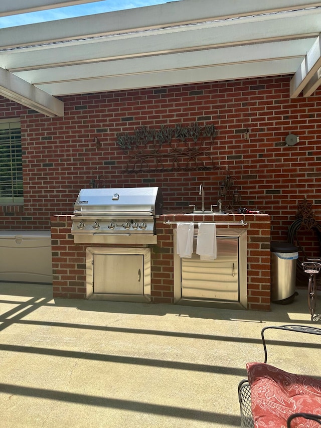 view of terrace featuring a grill and area for grilling