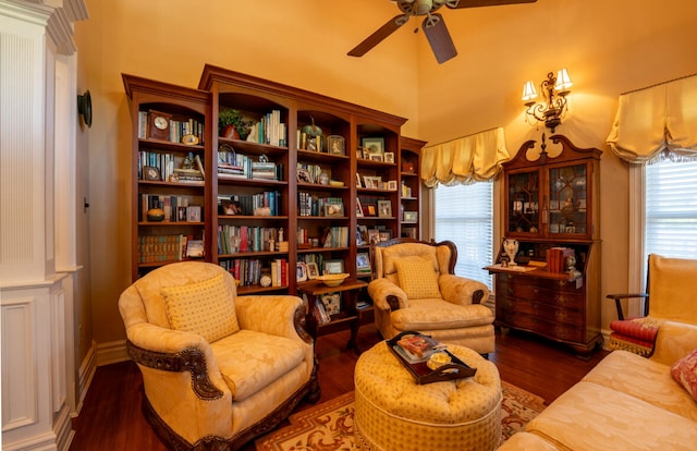 sitting room featuring ceiling fan and dark hardwood / wood-style flooring