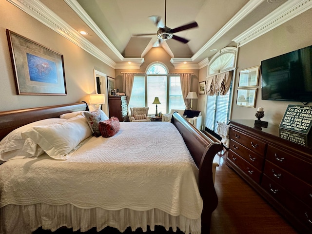 bedroom with vaulted ceiling, dark hardwood / wood-style flooring, ceiling fan, and crown molding