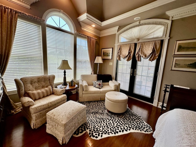 living room featuring ornamental molding, french doors, and wood-type flooring