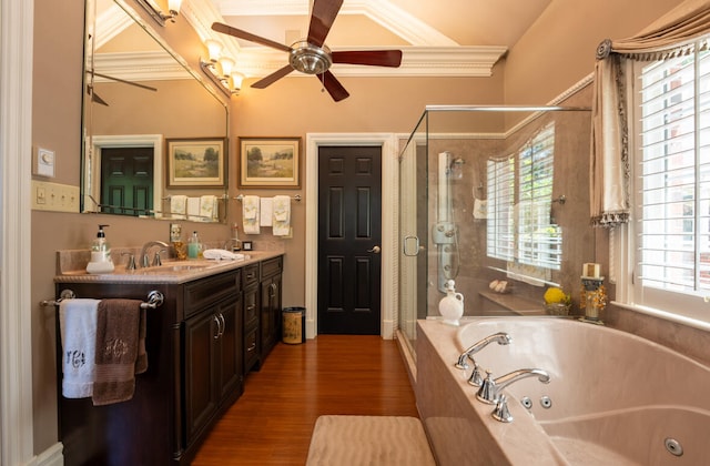 bathroom with ceiling fan, hardwood / wood-style floors, ornamental molding, independent shower and bath, and vanity